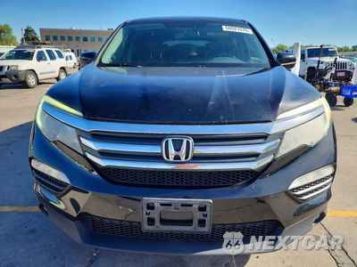 Piąte zdjęcie samochodu w środku: 2018 HONDA PILOT EXL VIN:5FNYF6H54JB022994 - miniatura