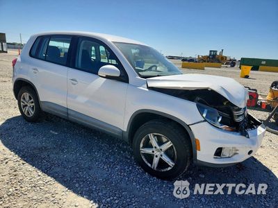 Czwarte zdjęcie samochodu z boku: 2014 VOLKSWAGEN TIGUAN S VIN:WVGAV3AX9EW512827 - miniatura