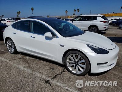 Czwarte zdjęcie samochodu z boku: 2018 TESLA MODEL 3 VIN:5YJ3E1EBXJF111673 - miniatura