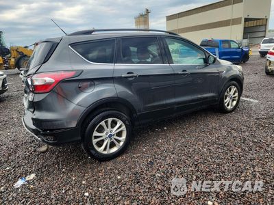Trzecie zdjęcie samochodu z tyłu: 2017 FORD ESCAPE SE VIN:1FMCU0GD6HUA14138 - miniatura
