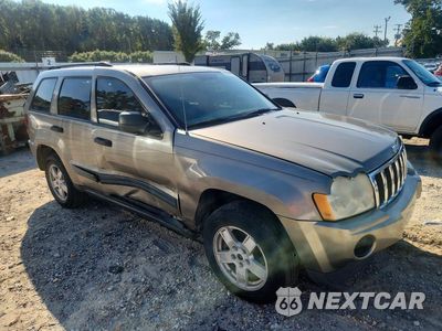 Czwarte zdjęcie samochodu z boku: 2005 JEEP GRAND CHEROKEE LAREDO VIN:1J8GR48K05C609587 - miniatura