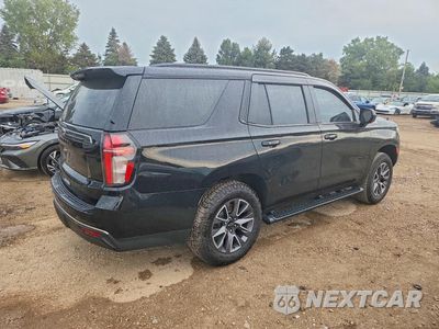 Trzecie zdjęcie samochodu z tyłu: 2021 CHEVROLET TAHOE K1500 Z71 VIN:1GNSKPKD1MR487455 - miniatura