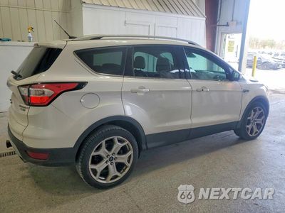Trzecie zdjęcie samochodu z tyłu: 2017 FORD ESCAPE TITANIUM VIN:1FMCU9J97HUC38155 - miniatura