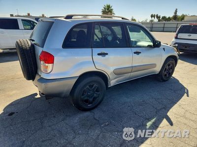 Trzecie zdjęcie samochodu z tyłu: 2002 TOYOTA RAV4 BASE VIN:JTEGH20V820057978 - miniatura