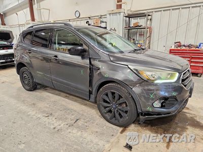 Czwarte zdjęcie samochodu z boku: 2017 FORD ESCAPE SE VIN:1FMCU9G98HUA11113 - miniatura