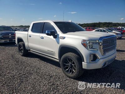 Czwarte zdjęcie samochodu z boku: 2021 GMC SIERRA K1500 DENALI VIN:3GTU9FED8MG450714 - miniatura