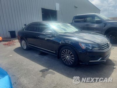 Czwarte zdjęcie samochodu z boku: 2016 VOLKSWAGEN PASSAT SE VIN:1VWBS7A30GC047104 - miniatura