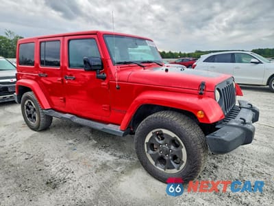 Czwarte zdjęcie samochodu z boku: 2014 JEEP WRANGLER UNLIMITED SAHARA VIN:1C4HJWEG0EL324418 - miniatura