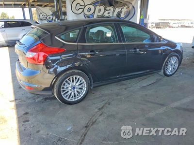 Trzecie zdjęcie samochodu z tyłu: 2013 FORD FOCUS TITANIUM VIN:1FADP3N20DL382596 - miniatura
