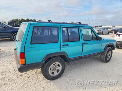 Trzecie zdjęcie samochodu z tyłu: 1996 JEEP CHEROKEE SPORT VIN:1J4FJ68S9TL132106 - miniatura