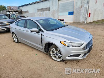 Czwarte zdjęcie samochodu z boku: 2017 FORD FUSION SE HYBRID VIN:3FA6P0LU3HR386922 - miniatura