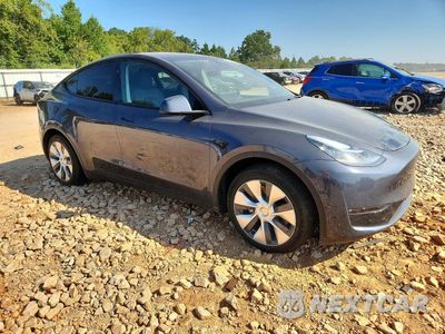 Czwarte zdjęcie samochodu z boku: 2023 TESLA MODEL Y VIN:7SAYGDEE2PA140346 - miniatura