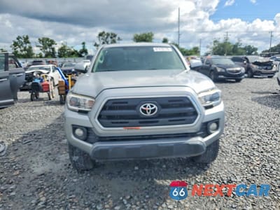Piąte zdjęcie samochodu w środku: 2016 TOYOTA TACOMA SR5 V6 VIN:5TFSZ5AN5GX006867 - miniatura