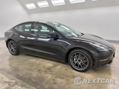 Czwarte zdjęcie samochodu z boku: 2022 TESLA MODEL 3 VIN:5YJ3E1EA0NF186265 - miniatura