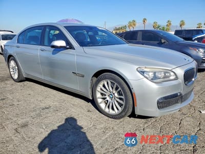 Czwarte zdjęcie samochodu z boku: 2014 BMW 750 LXI VIN:WBAYF8C56ED652741 - miniatura