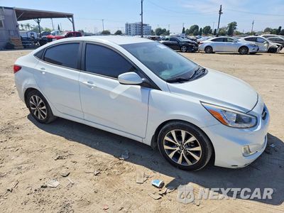 Czwarte zdjęcie samochodu z boku: 2015 HYUNDAI ACCENT GLS VIN:KMHCU4AE3FU805359 - miniatura