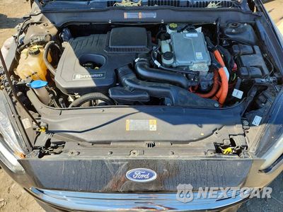 Zdjęcie 11 z 12 samochodu: 2014 FORD FUSION TITANIUM HEV VIN:3FA6P0RU8ER238140 - miniatura