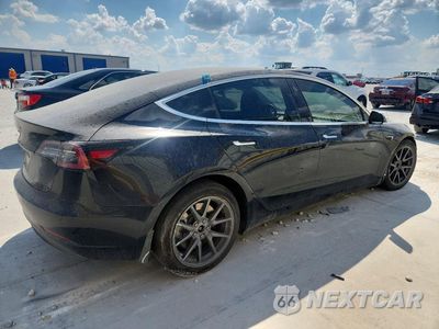 Trzecie zdjęcie samochodu z tyłu: 2018 TESLA MODEL 3 VIN:5YJ3E1EA0JF070283 - miniatura