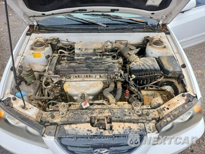 Zdjęcie 11 z 13 samochodu: 2005 HYUNDAI ELANTRA GLS VIN:KMHDN46D95U992932 - miniatura