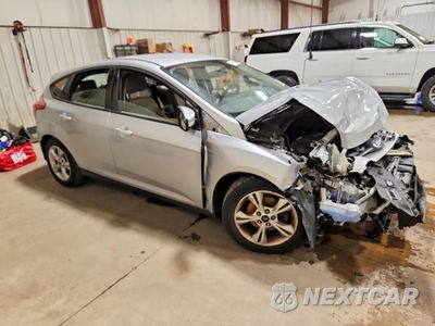 Czwarte zdjęcie samochodu z boku: 2014 FORD FOCUS SE VIN:1FADP3K22EL437376 - miniatura