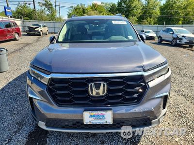 Piąte zdjęcie samochodu w środku: 2024 HONDA PILOT TOURING VIN:5FNYG1H72RB000618 - miniatura
