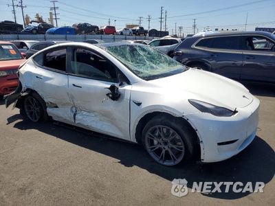 Czwarte zdjęcie samochodu z boku: 2024 TESLA MODEL Y VIN:7SAYGDED5RF182703 - miniatura