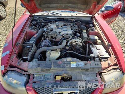 Zdjęcie 11 z 12 samochodu: 2003 FORD MUSTANG VIN:1FAFP40443F354305 - miniatura