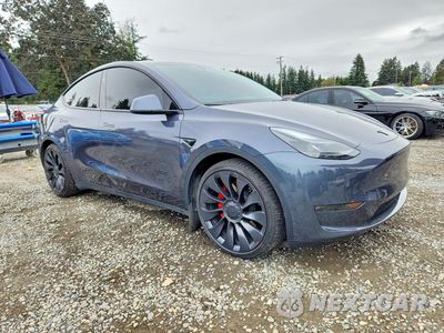 Czwarte zdjęcie samochodu z boku: 2023 TESLA MODEL Y VIN:7SAYGDEF0PF883194 - miniatura