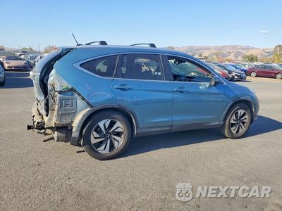 Trzecie zdjęcie samochodu z tyłu: 2015 HONDA CR-V TOURING VIN:5J6RM4H9XFL119259 - miniatura