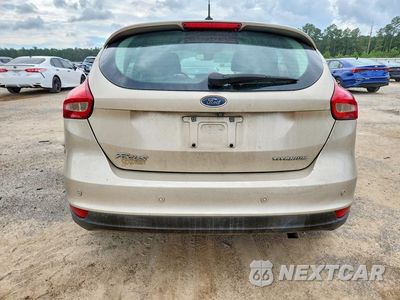 Zdjęcie 6 z 12 samochodu: 2017 FORD FOCUS TITANIUM VIN:1FADP3N25HL330855 - miniatura