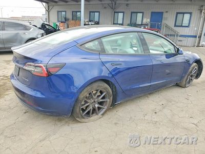 Trzecie zdjęcie samochodu z tyłu: 2022 TESLA MODEL 3 VIN:5YJ3E1EB2NF318984 - miniatura