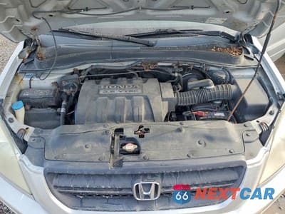 Zdjęcie 12 z 13 samochodu: 2005 HONDA PILOT EXL VIN:2HKYF18535H572813 - miniatura