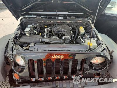 Zdjęcie 12 z 13 samochodu: 2013 JEEP WRANGLER UNLIMITED SPORT VIN:1C4BJWDG5DL621531 - miniatura