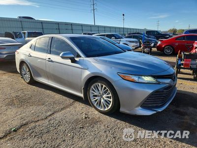 Czwarte zdjęcie samochodu z boku: 2019 TOYOTA CAMRY HYBRID XLE VIN:4T1B21HK0KU013272 - miniatura