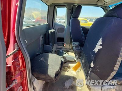 Zdjęcie 10 z 12 samochodu: 2011 FORD RANGER SUPER CAB VIN:1FTLR4FE8BPA77058 - miniatura