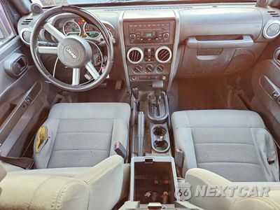 Zdjęcie 8 z 13 samochodu: 2008 JEEP WRANGLER UNLIMITED SAHARA VIN:1J4GA59188L608759 - miniatura