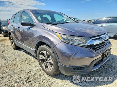 Czwarte zdjęcie samochodu z boku: 2017 HONDA CR-V LX VIN:7FARW5H35HE012583 - miniatura