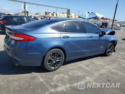 Trzecie zdjęcie samochodu z tyłu: 2018 FORD FUSION SE HYBRID VIN:3FA6P0LU1JR207816 - miniatura