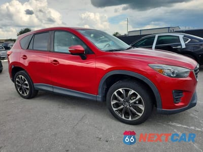 Czwarte zdjęcie samochodu z boku: 2016 MAZDA CX-5 GT VIN:JM3KE2DY7G0841109 - miniatura