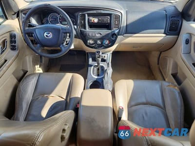 Zdjęcie 8 z 14 samochodu: 2005 MAZDA TRIBUTE S VIN:4F2YZ06155KM41529 - miniatura