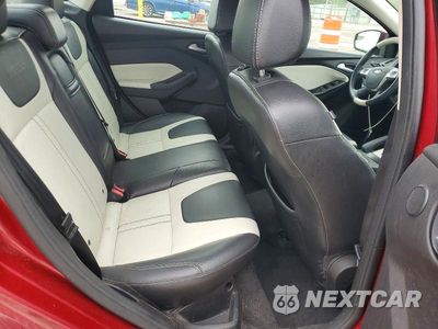 Zdjęcie 10 z 12 samochodu: 2014 FORD FOCUS TITANIUM VIN:1FADP3J28EL407297 - miniatura