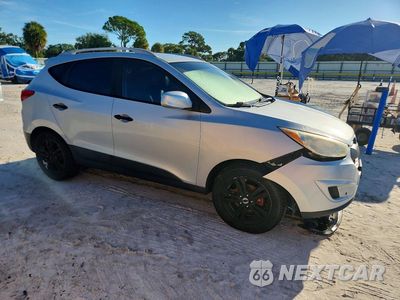 Czwarte zdjęcie samochodu z boku: 2011 HYUNDAI TUCSON GLS VIN:KM8JU3AC0BU263180 - miniatura