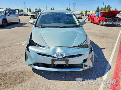 Piąte zdjęcie samochodu w środku: 2017 TOYOTA PRIUS TWO VIN:JTDKBRFUXH3043434 - miniatura