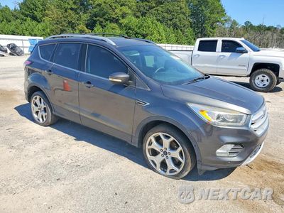 Czwarte zdjęcie samochodu z boku: 2018 FORD ESCAPE TITANIUM VIN:1FMCU0J97JUA16474 - miniatura