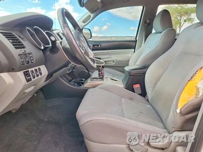 Zdjęcie 7 z 12 samochodu: 2015 TOYOTA TACOMA V6 VIN:3TMLU4EN1FM204342 - miniatura