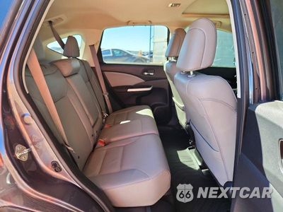 Zdjęcie 11 z 14 samochodu: 2016 HONDA CR-V TOURING VIN:5J6RM3H90GL001037 - miniatura