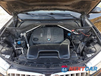 Zdjęcie 12 z 13 samochodu: 2014 BMW X5 XDRIVE35D VIN:5UXKS4C56E0J97053 - miniatura