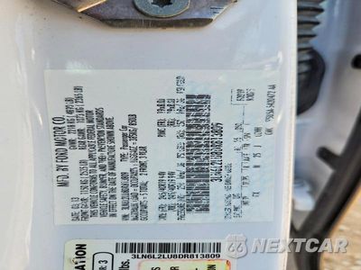 Zdjęcie 13 z 13 samochodu: 2013 LINCOLN MKZ HYBRID VIN:3LN6L2LU8DR813809 - miniatura