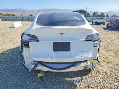 Zdjęcie 6 z 13 samochodu: 2022 TESLA MODEL Y VIN:7SAYGAEE9NF490037 - miniatura