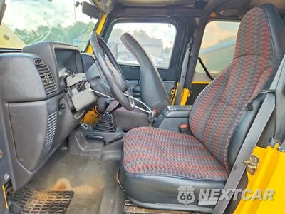 Zdjęcie 7 z 13 samochodu: 2000 JEEP WRANGLER / TJ SPORT VIN:1J4FA49S4YP754518 - miniatura